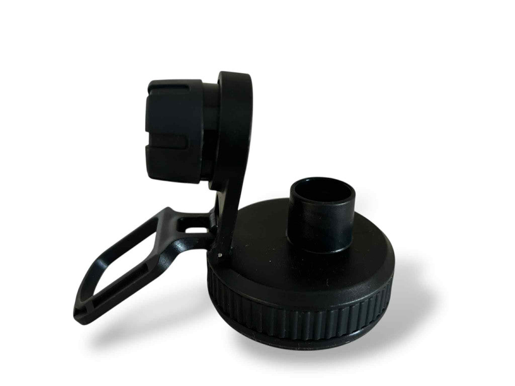 Black plastic component on a white background