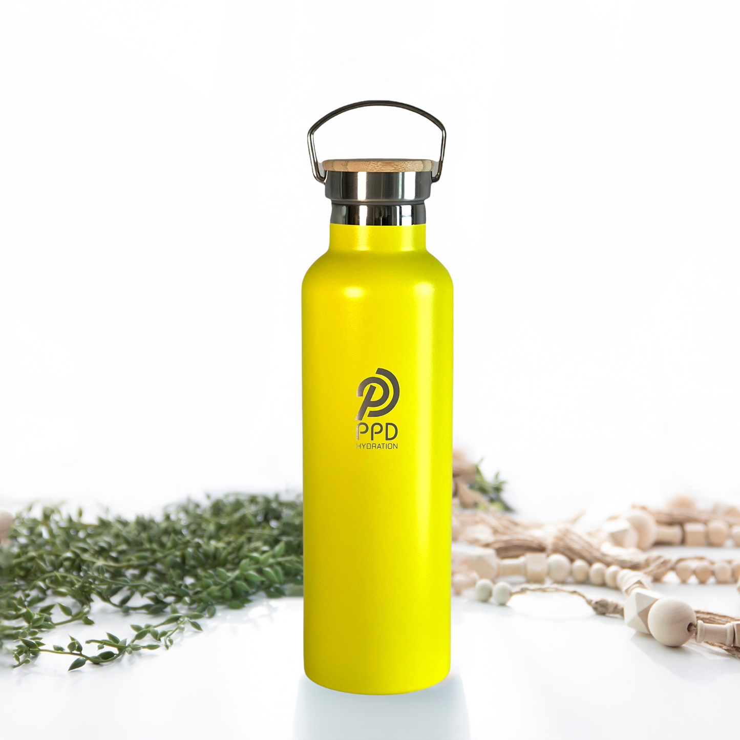 A yellow stainless steel insulated water bottle with a bamboo lid, handle at top with a straw, and logo on the front.